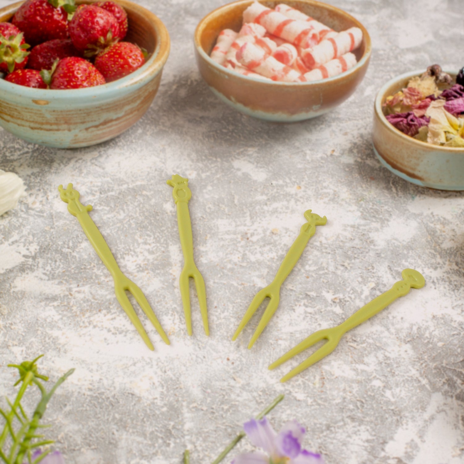 Mini plastic fruit forks in compact jar