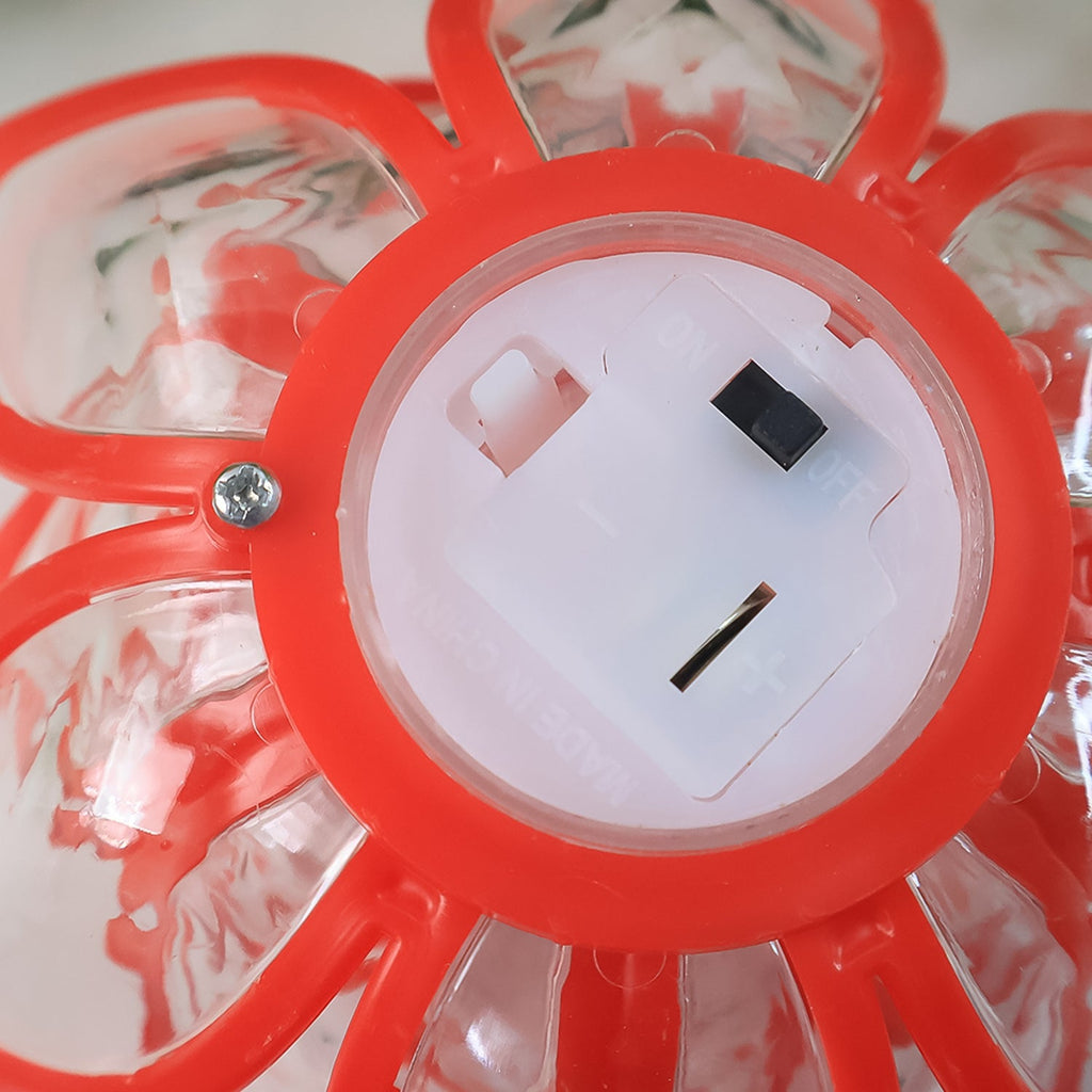 Flameless LED candle in lotus design creating warm ambiance