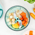 Sleek manual food processor with a sturdy base for stable operation.