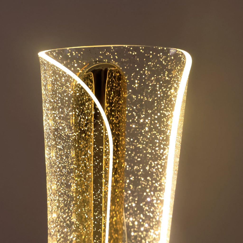 Modern tall cylindrical LED crystal table lamp on metallic base