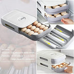 The egg storage box with its drawer partially open, demonstrating smooth operation.