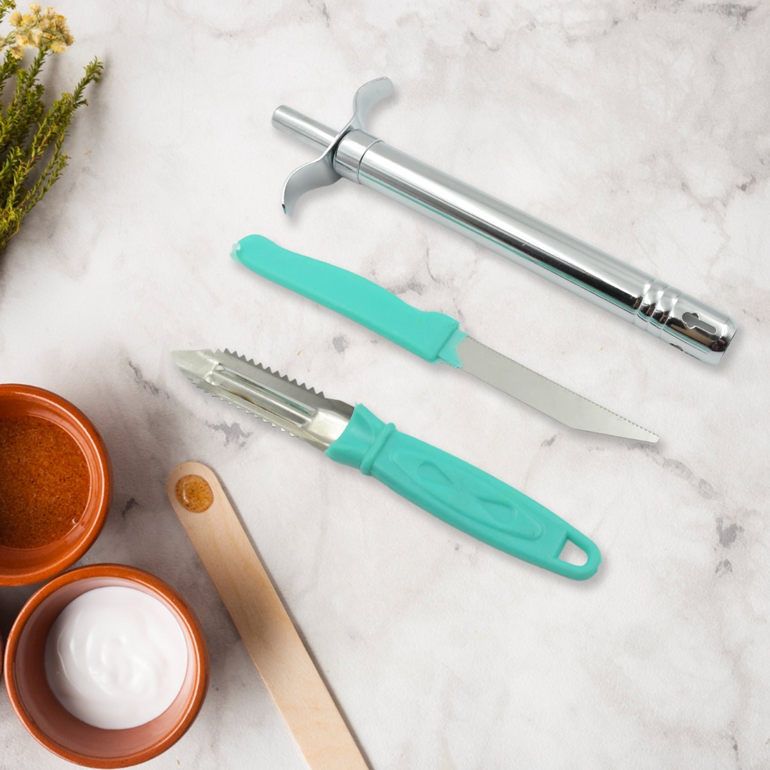 Detailed view of the Quickslice gas lighter and versatile stainless steel kitchen knife.