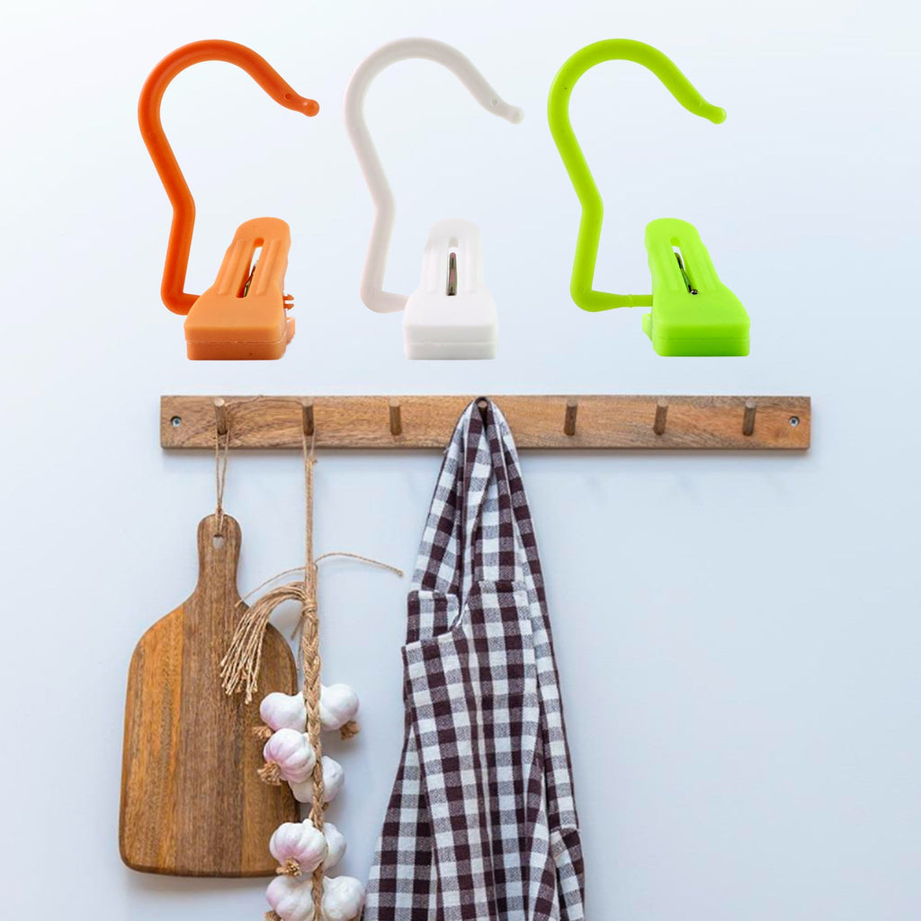 Hanging hook clip attached securely to a rod for hanging clothes