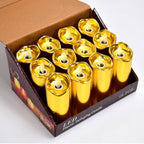 Close-up of a single golden flickering LED candle with a realistic flame effect.