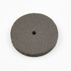 Detailed view of a single durable resin grinder cutting disc for metalwork.