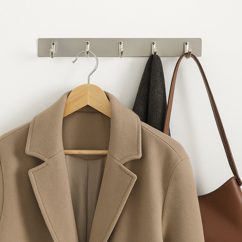 Durable stainless steel wall rack installed in bedroom for clothes hanging
