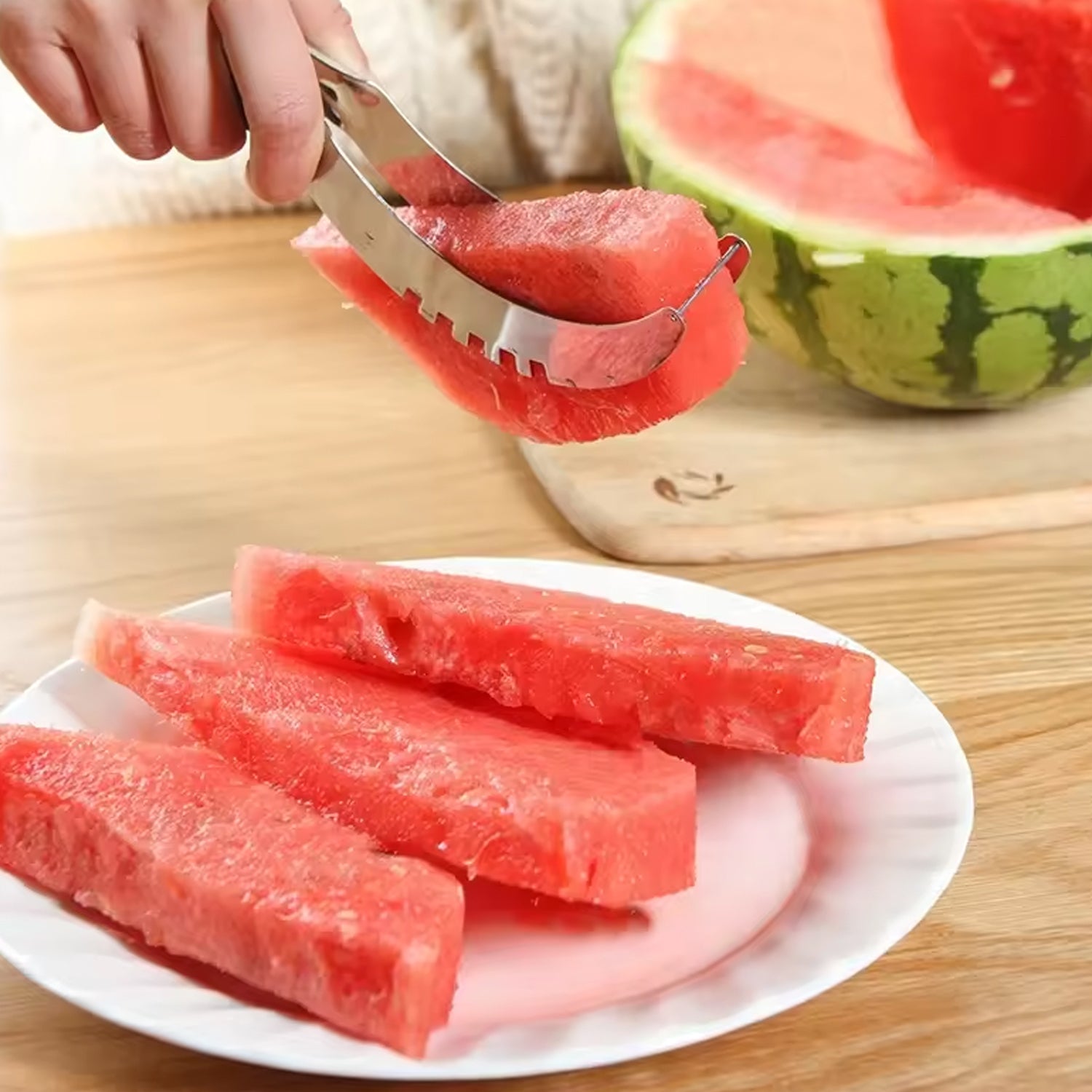 The Quickslice 3-in-1 watermelon slicer tool displayed on a clean white background.