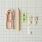 Close-up of wall hanging tools with measuring tape and bubble level