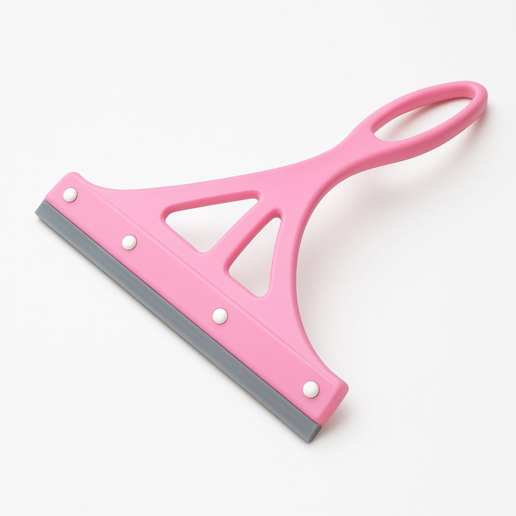 Multipurpose plastic wiper resting on a clean kitchen platform.