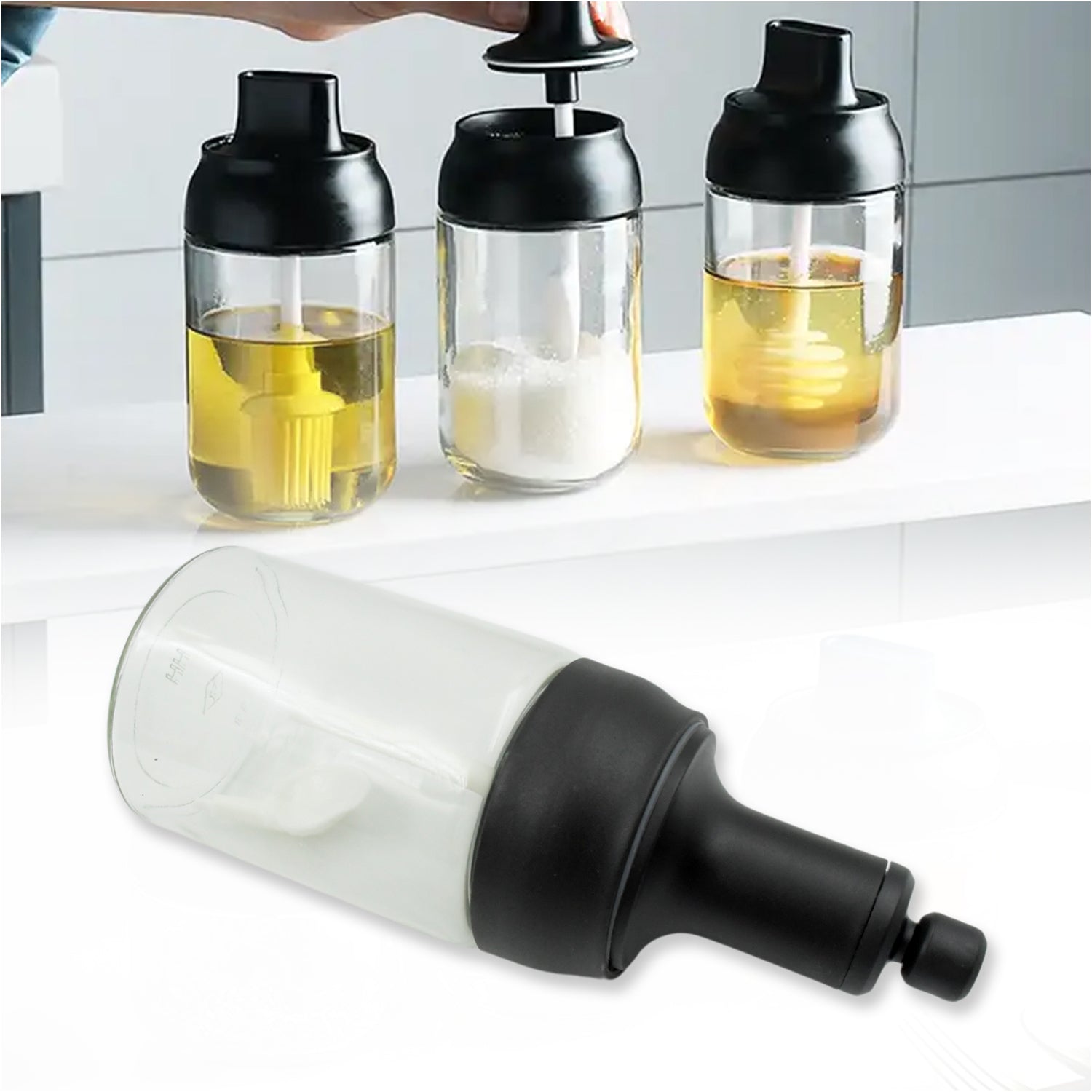 A Heat-Resistant Glass Seasoning Jar with integrated spoon, perfect for kitchen use.