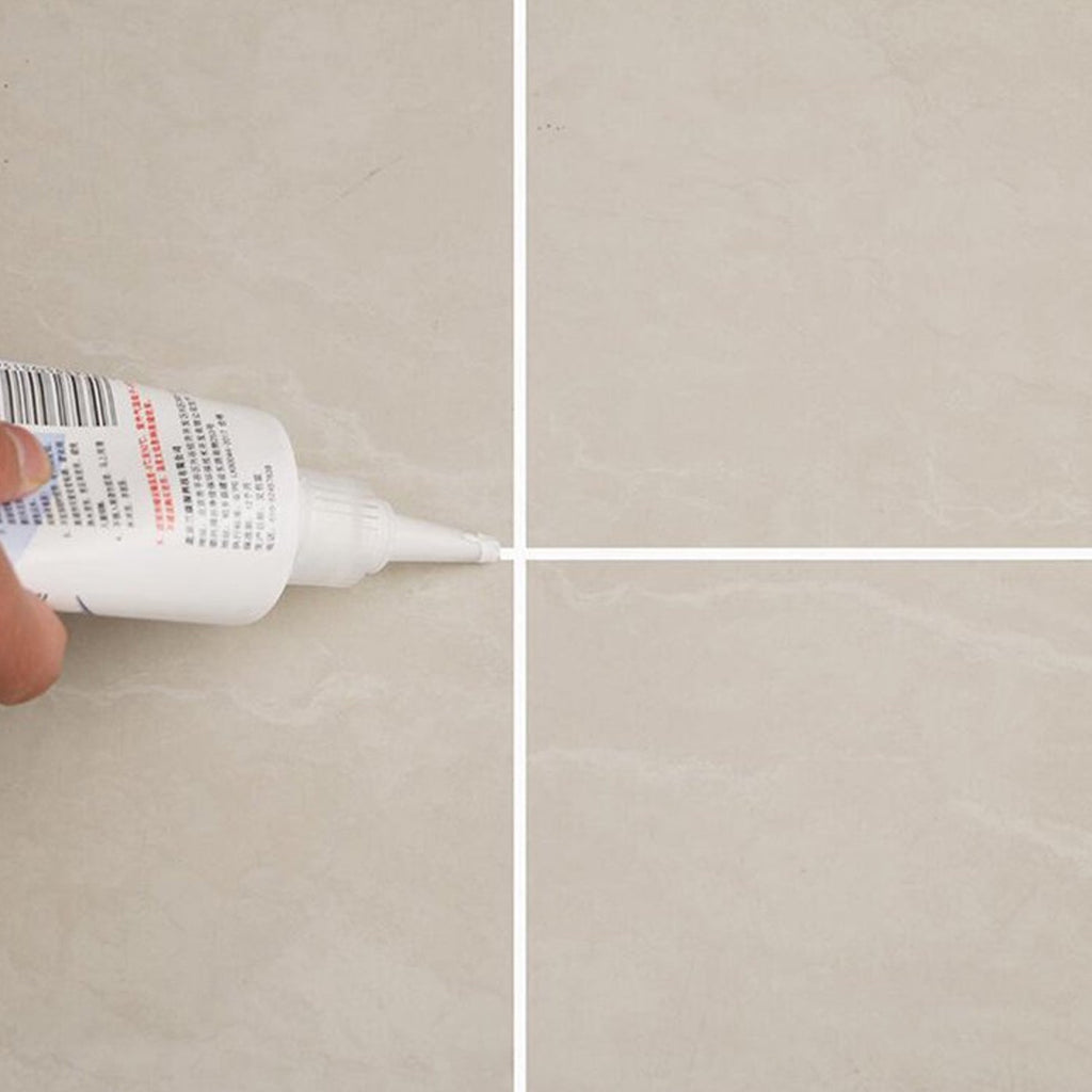 Freshly sealed tiled floor showing clean grout lines after application of the gap filler.