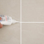 Freshly sealed tiled floor showing clean grout lines after application of the gap filler.