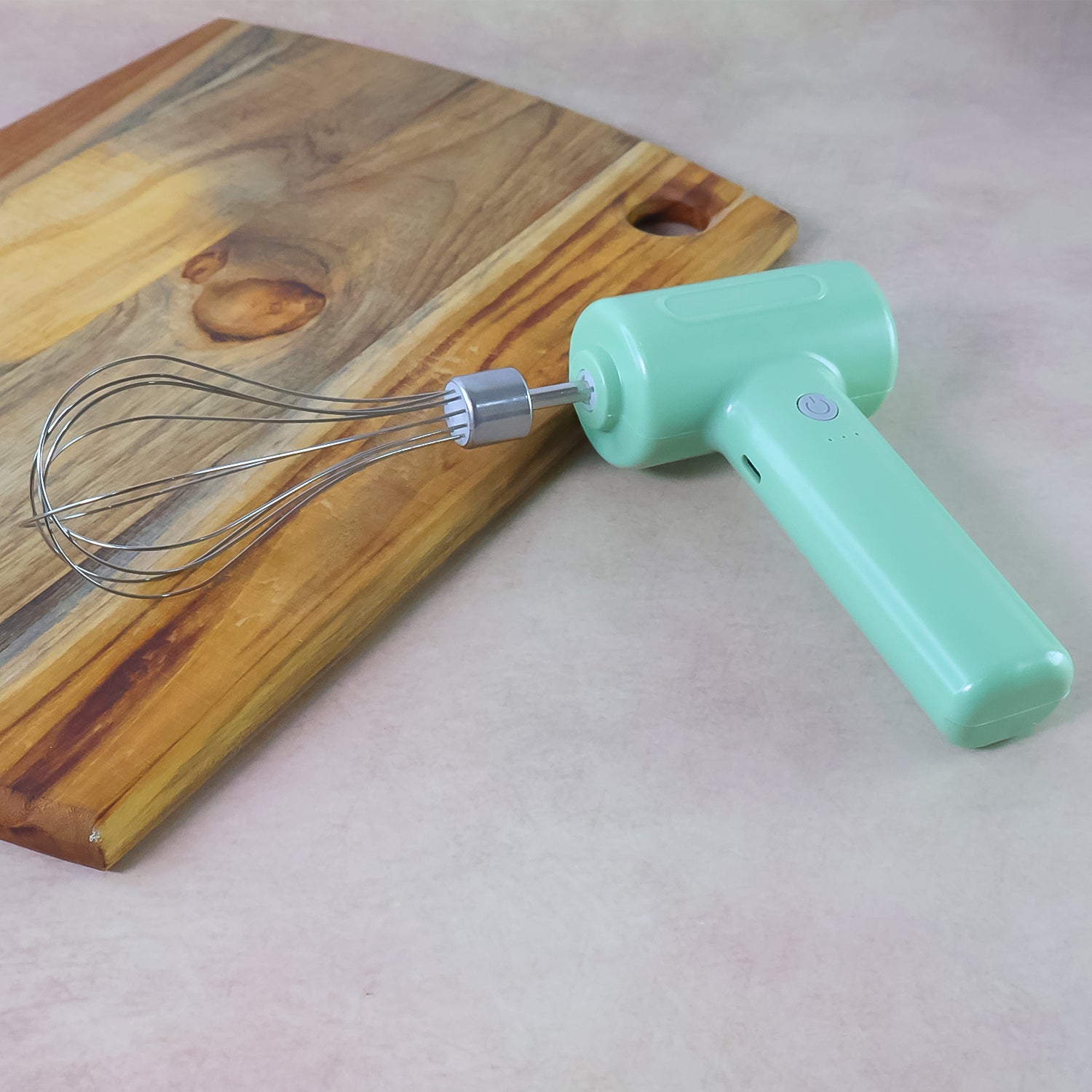 Cordless Electric Whisk connected for USB charging, with clear LED indicators.