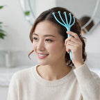 Person enjoying relaxation using five-finger scalp massager
