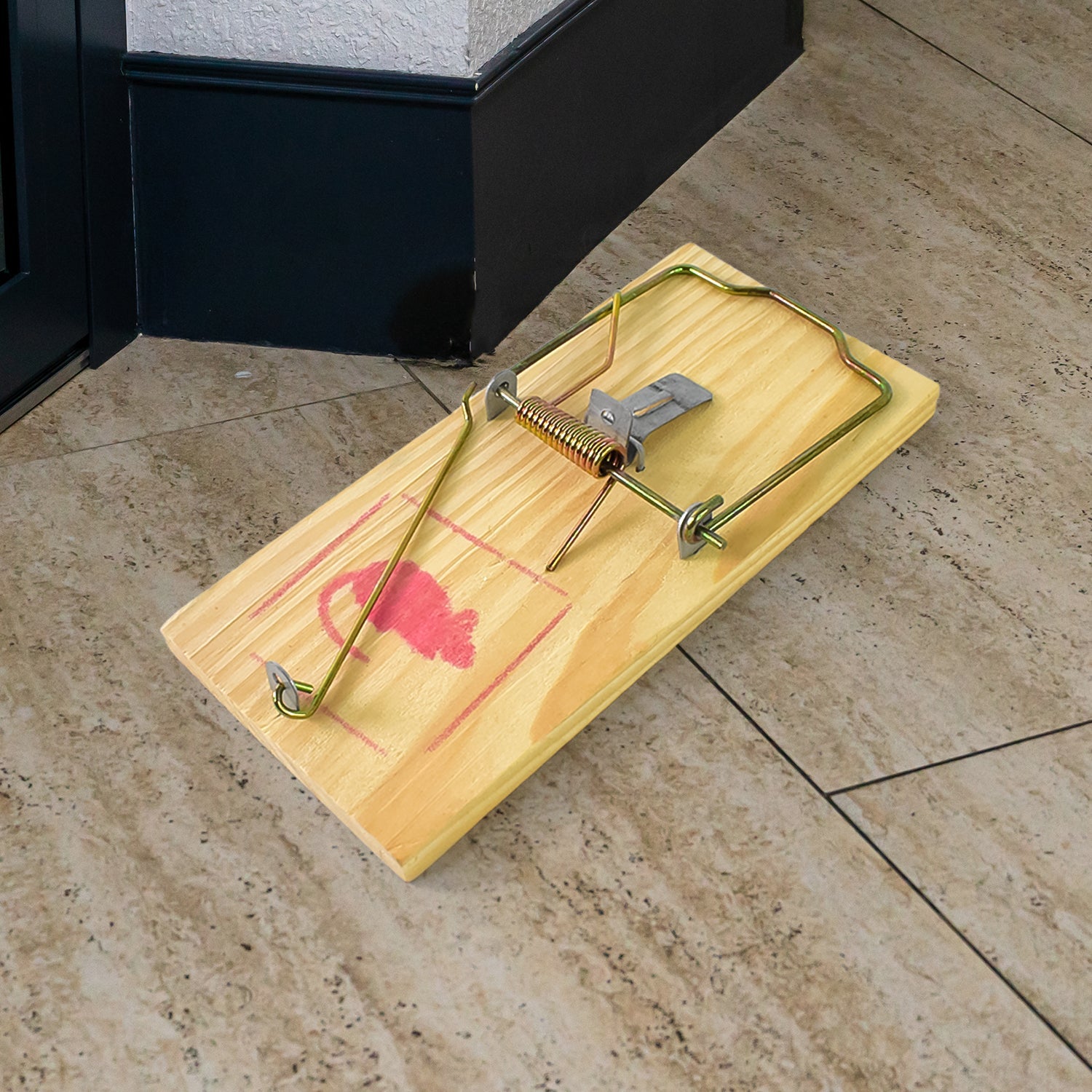 Wooden mouse trap including metal clip for effective capture