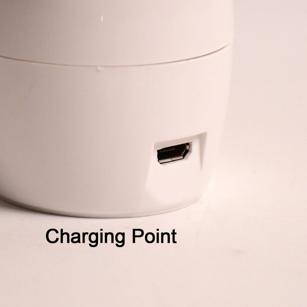 Side angle of plug-in LED nail dryer showing compact design