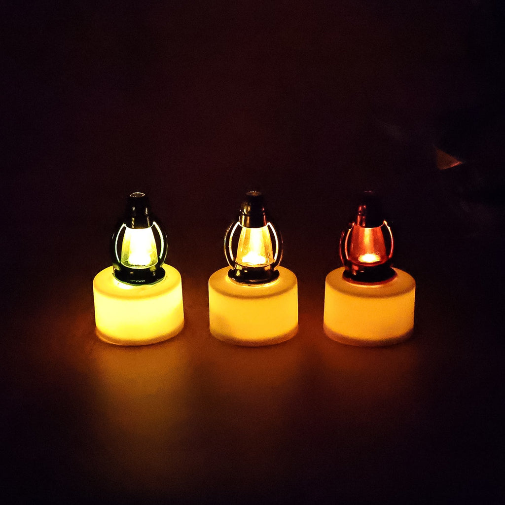 Elegant flameless LED candles with colorful lantern tops displayed in storage box