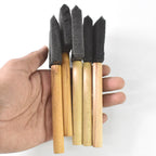 Using sponge paint brushes for crafting on canvas surface