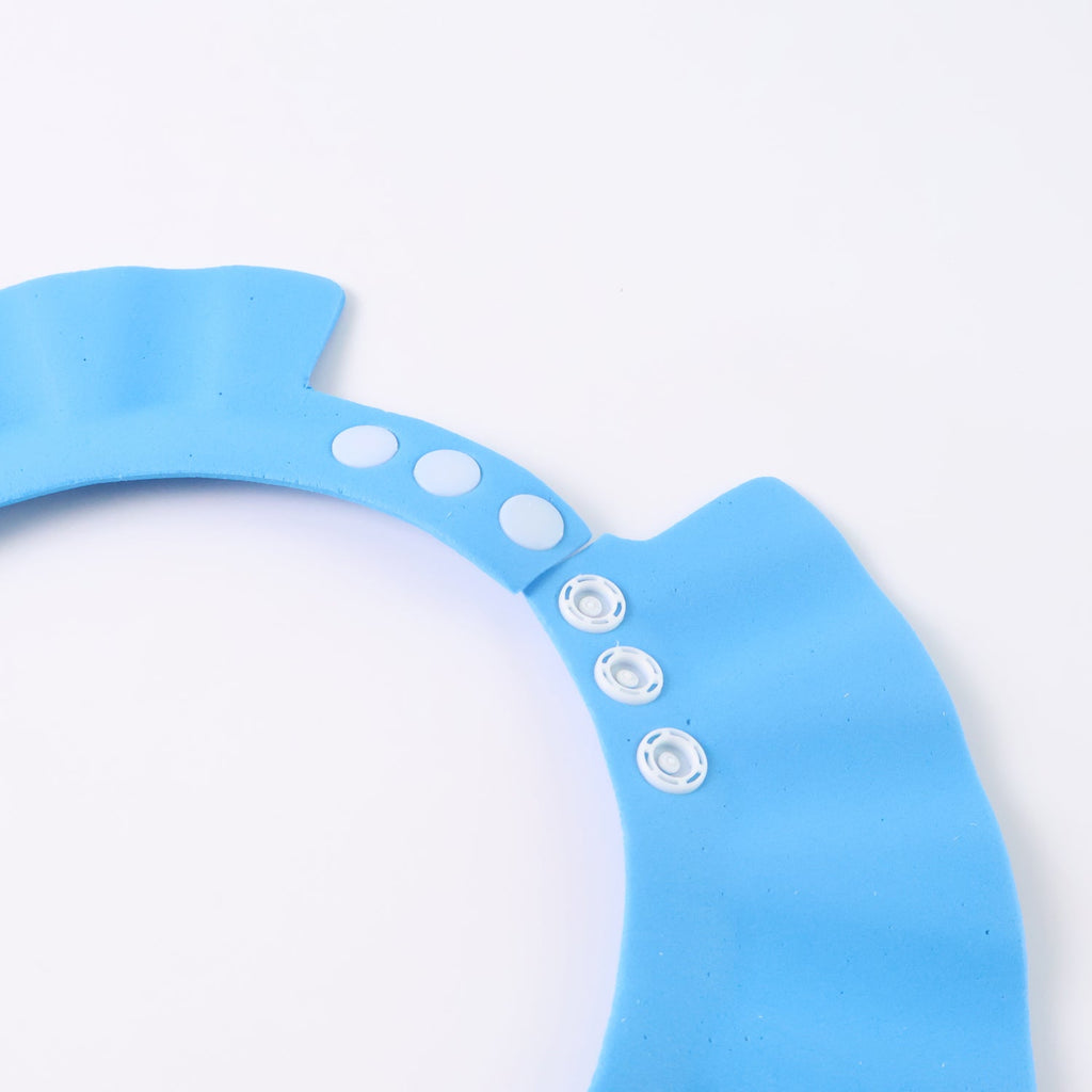 Infant shower cap designed to keep water away from eyes and ears