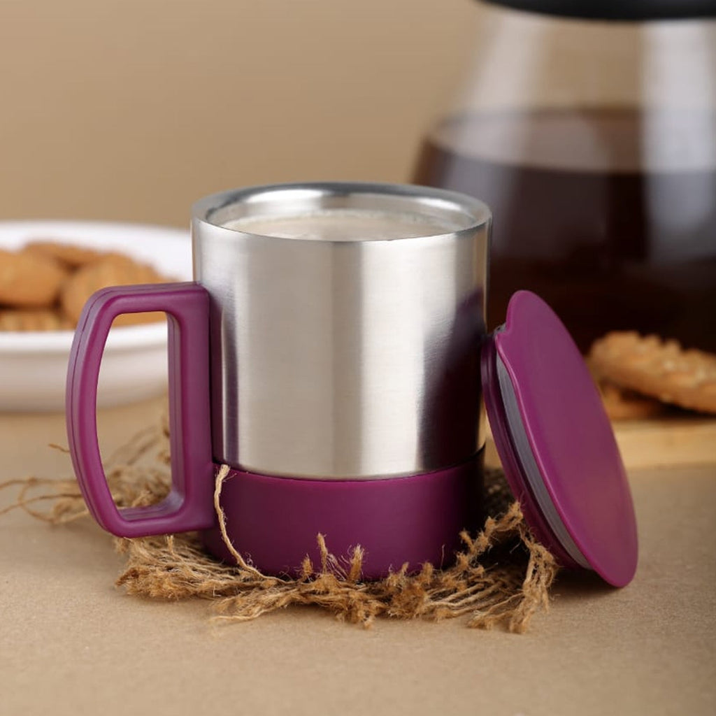 Sleek insulated steel coffee mug with spill-proof lid and ergonomic handle.