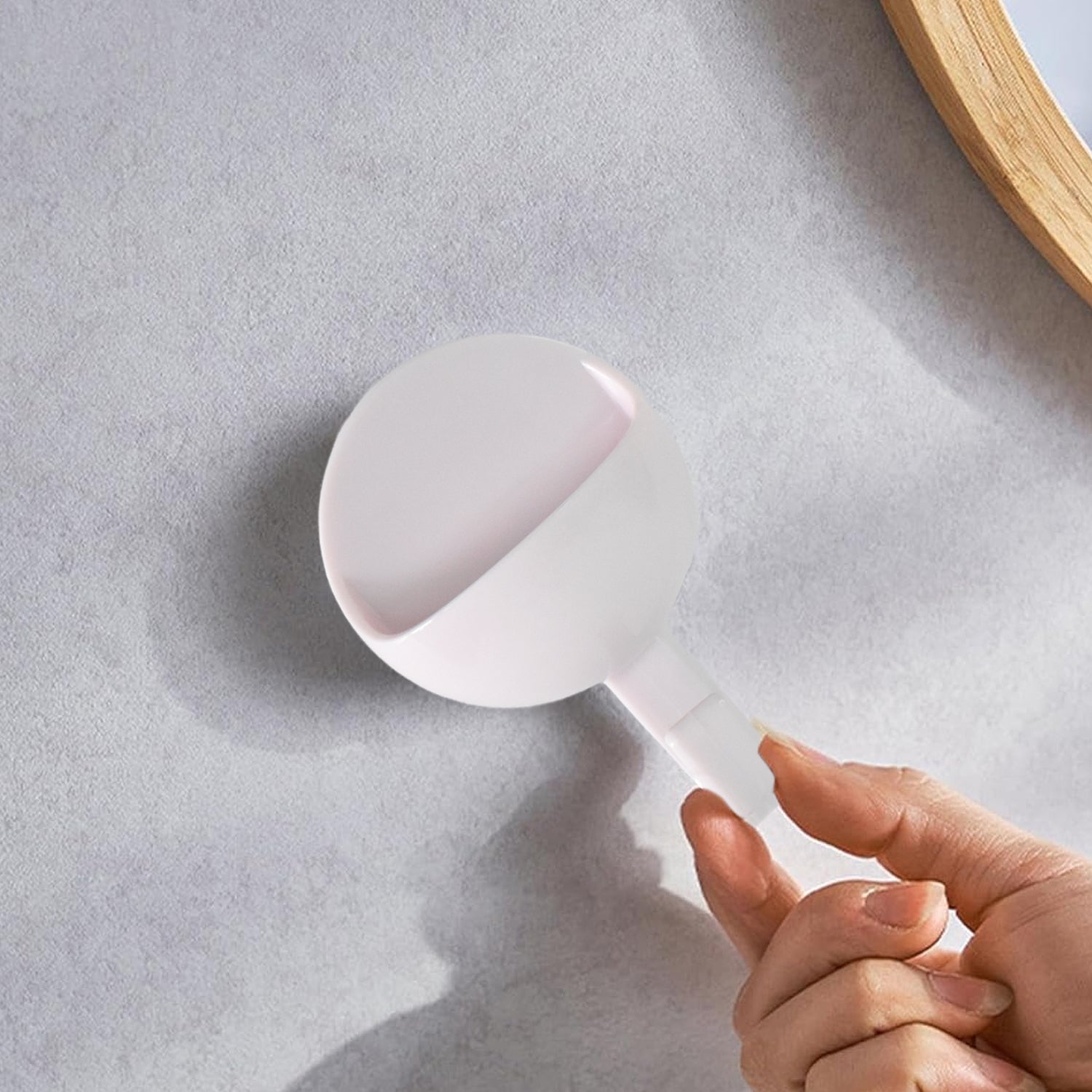 Set of self-adhesive strong wall hooks with various household uses.