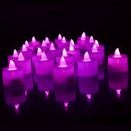 Close-up of a single flameless LED tealight, showing its realistic flicker.