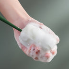 Versatile foam cleaning brush designed for various drinkware, including baby bottles.