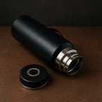 Stainless steel water bottle keeping drinks cold on a hot day.