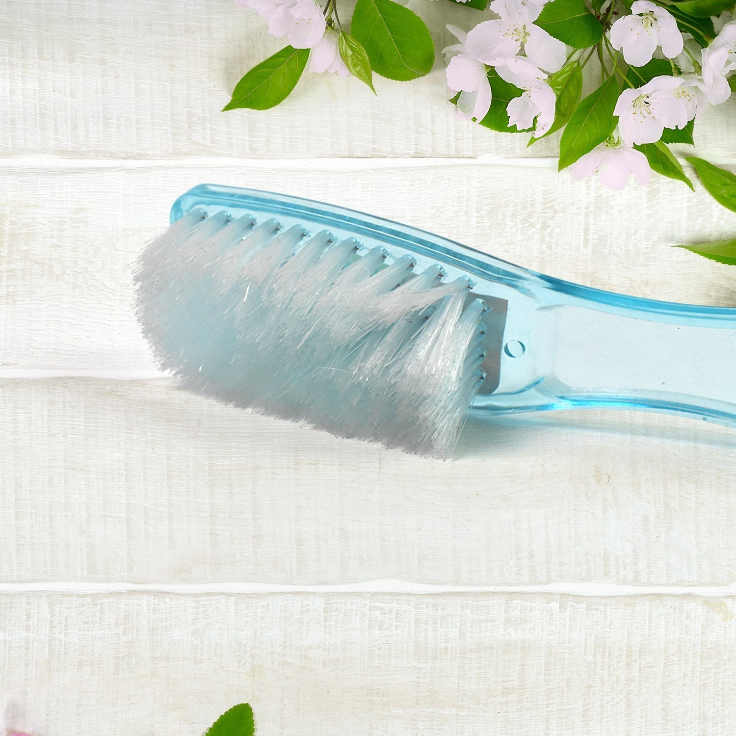 Close-up view of durable bristles on a plastic scrubbing brush.