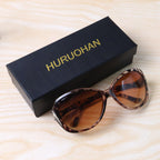 Lightweight full-rim sunglasses designed for both men and women, suitable for daily use.