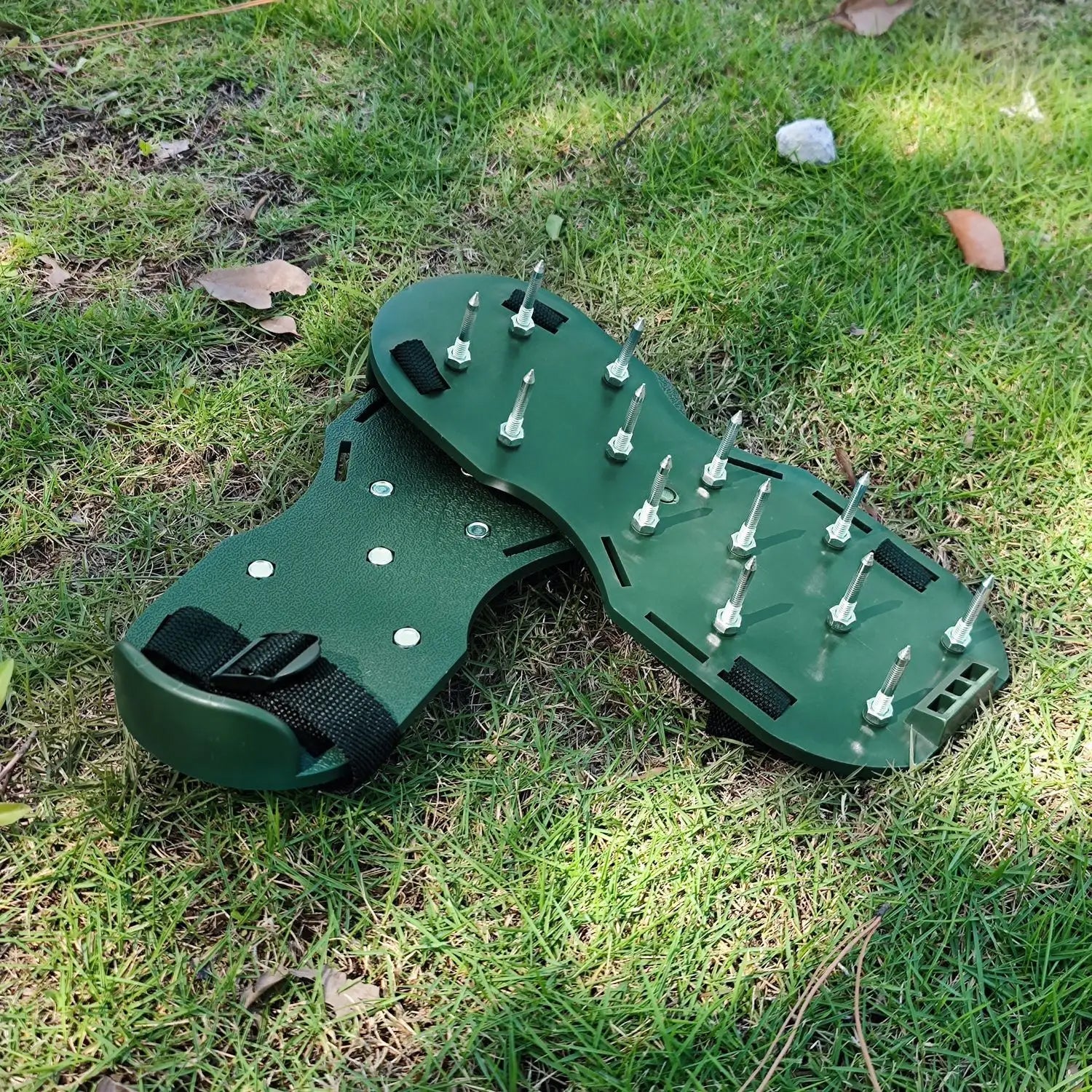 Close-up of the durable steel spikes on the Lawn Aerator Sandals for effective grass aeration.