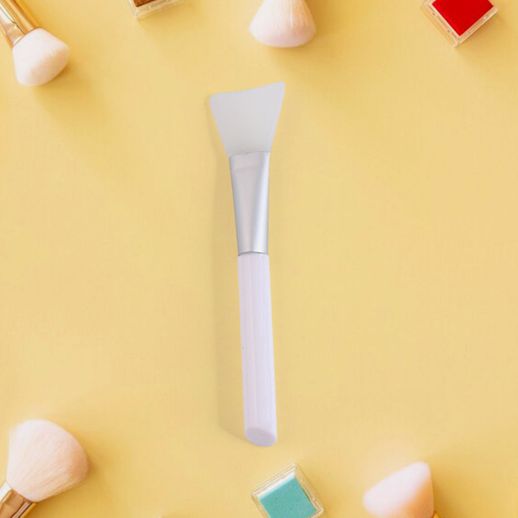 Side view of silicone mask applicator brush with flexible head