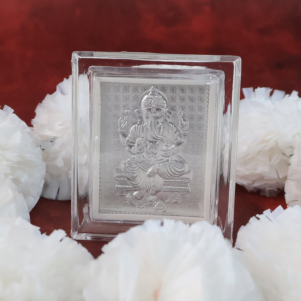 Side view of silver-plated Lord Ganesha photo frame for home altar