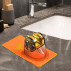 Close-up view of gold clamp on self-adhesive shower head holder
