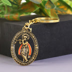 Two Lord Krishna metal keychains showing front and back designs