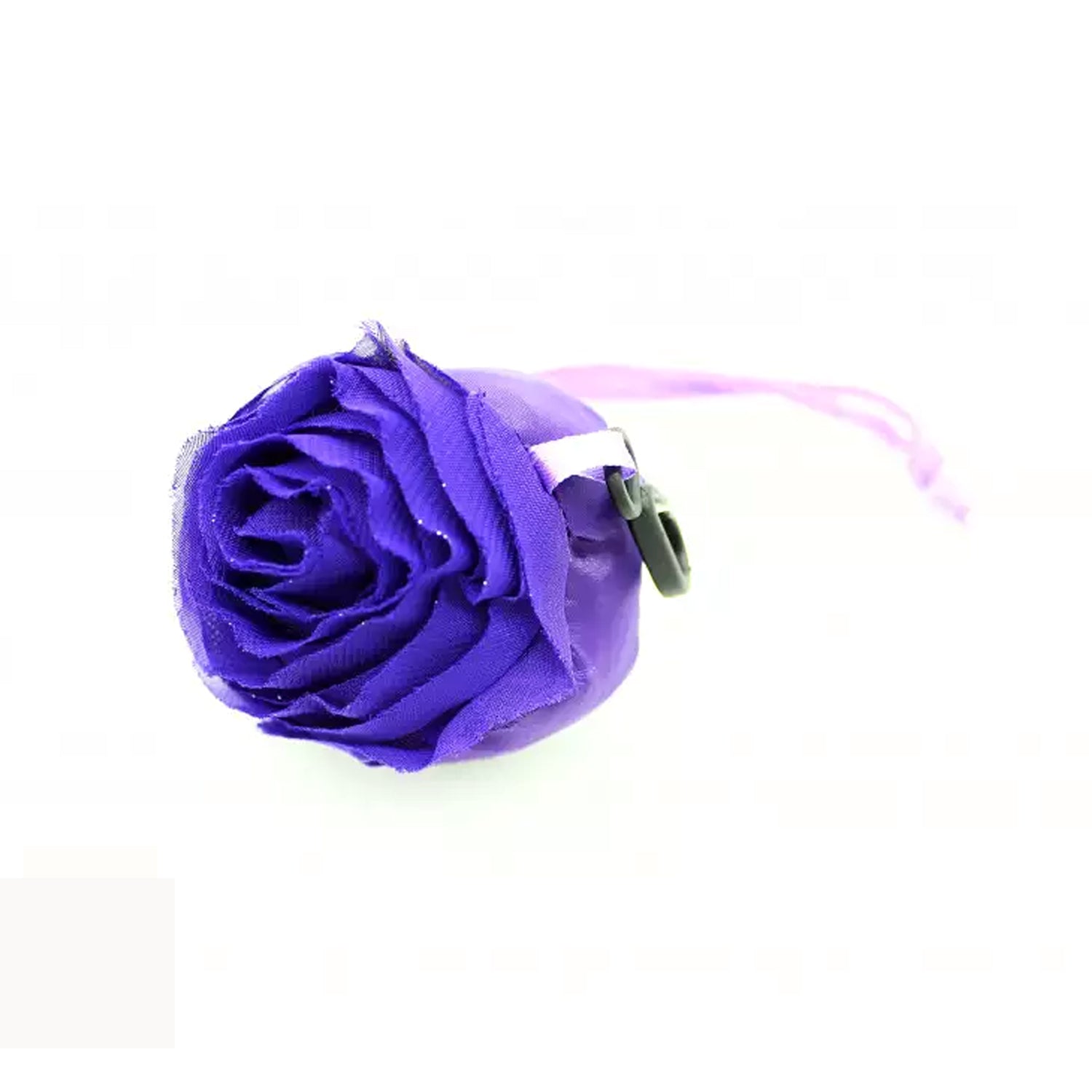 Compact rose-shaped pouch, demonstrating how the reusable shopping bag folds for portability.