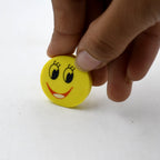 Bright and colorful smiley face erasers for children's stationery collection.