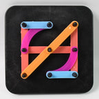Brightly coloured alphabet numeric puzzle pieces arranged in a grid pattern.