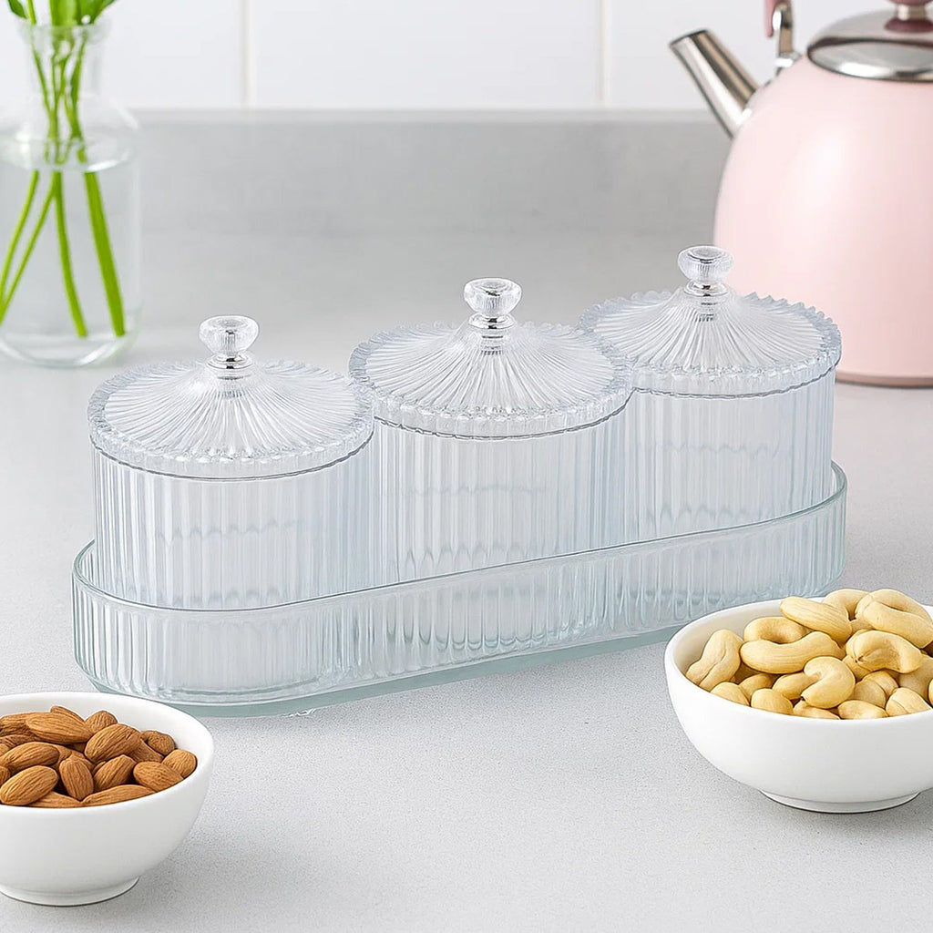Elegant set of dry fruit storage jars neatly arranged on matching tray