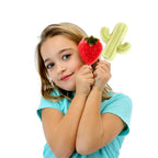 A hand holding a finished, perfectly shaped cactus ice pop made with the silicone mold.