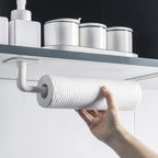 Visual demonstrating the easy, drill-free adhesive installation of the multipurpose hanging rack on a smooth kitchen tile surface.