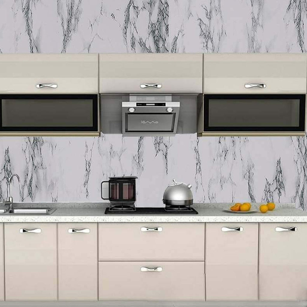 Spread out adhesive marble kitchen wallpaper roll showing peel and stick backing