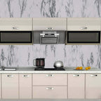 Spread out adhesive marble kitchen wallpaper roll showing peel and stick backing