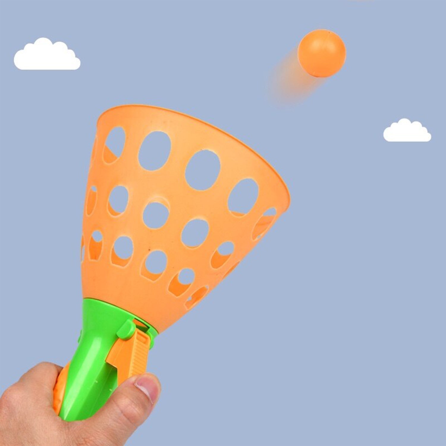 Brightly colored catapult ball toy set up for exciting outdoor play.