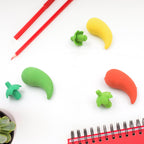Three chili shape erasers neatly packaged, ready for gifting.