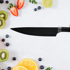 CookAura professional kitchen knives neatly arranged on a wooden cutting board.