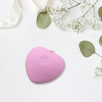 Silicone face brush in heart design for women’s daily skincare routine.