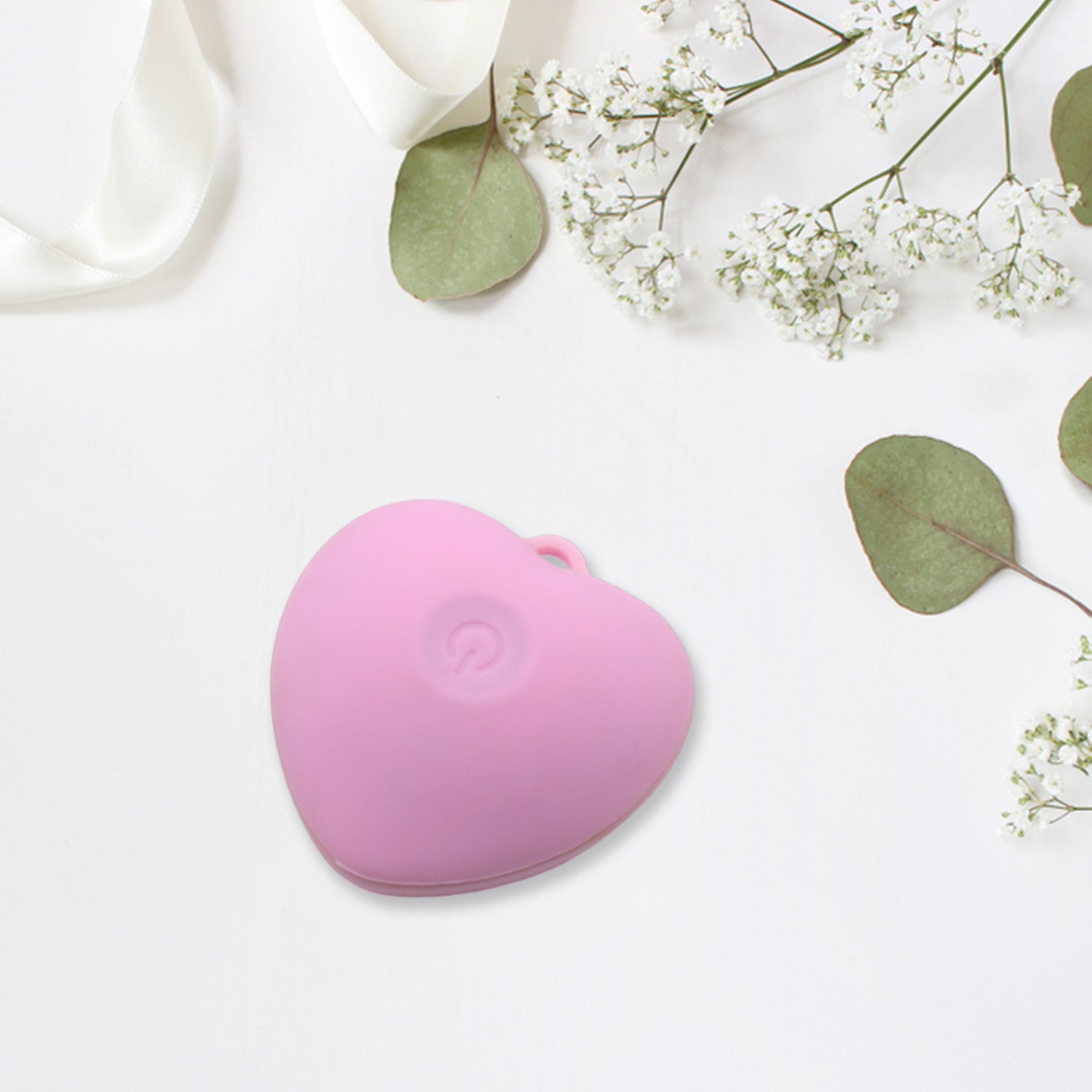 Silicone face brush in heart design for women’s daily skincare routine.