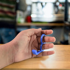 Durable plastic hook-style mobile stand holding smartphone upright