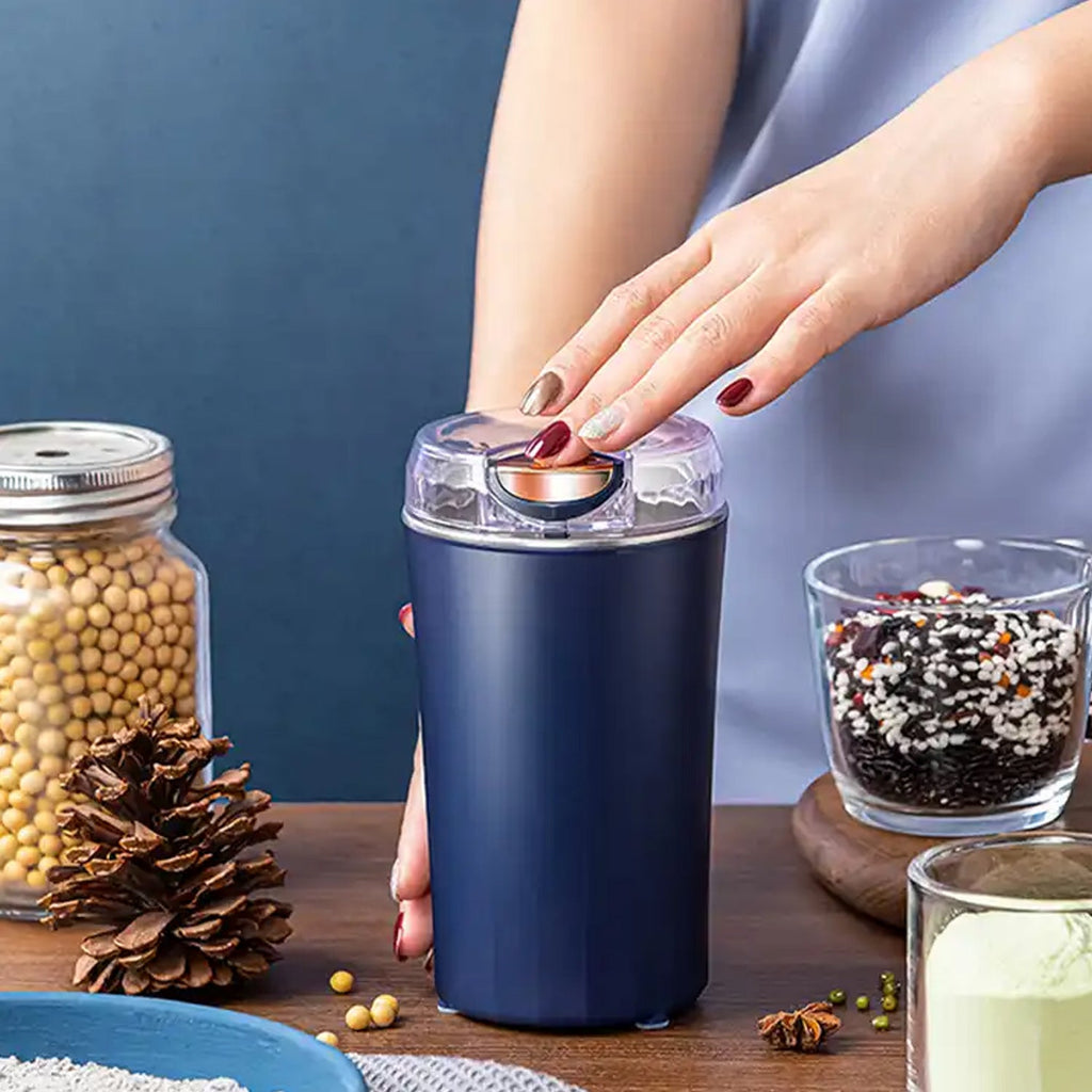 Dabster Coffee Grinder Blender, a compact 4-blade mixer for home use.